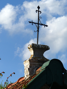 Foto van het kruis op de kapel